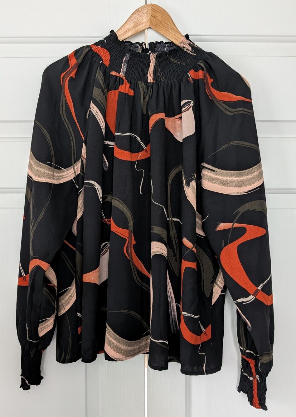Nine West Black Blouse with Rust and Blush Abstract Swirls